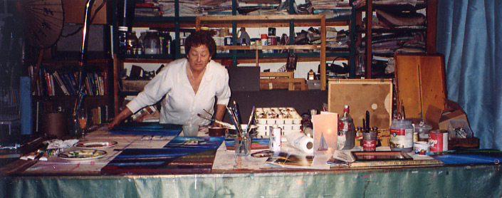 Susan mixing and watercoloring on long table